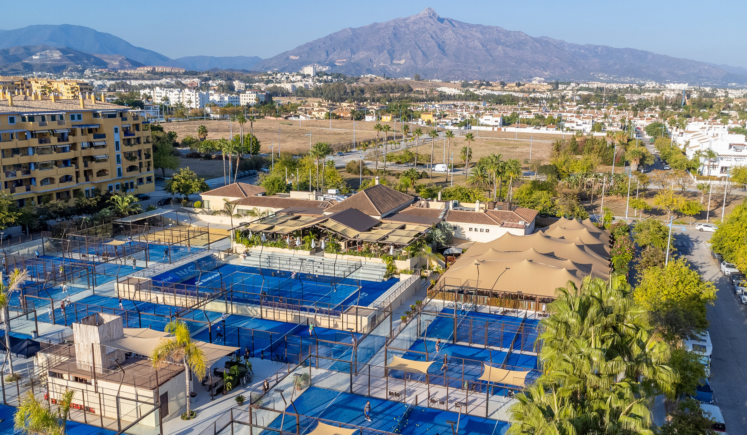 NAC padel courts with the La Concha mountain range beyond San Pedro de Alcántara